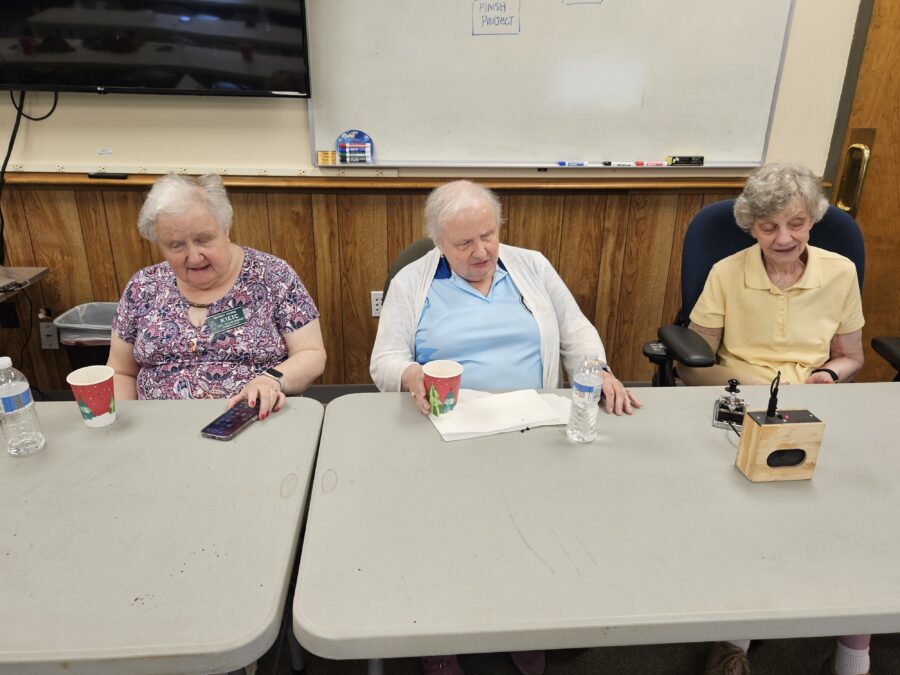 Betsy K1EIC, Barbara K1EIR and Anne K1STM after demonstrating Morse Code to the group.